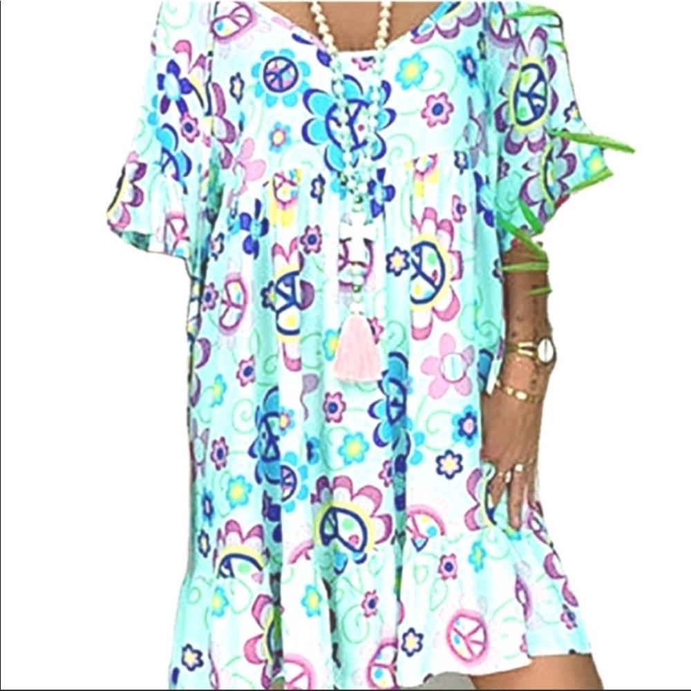 Mint green boat neck peace sign dress